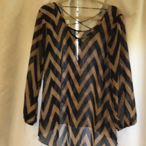 Sheer blouse with chevron design and high low hem. - Picture 2 of 4